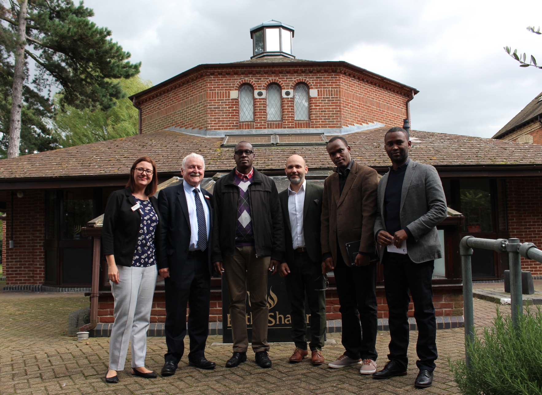 CNLG and staff from Aegis Rwanda visit the UK National Holocaust Centre. L-R: Sarah Wetton (educator), Phil Lyons (Centre CEO), Dr Jean Damascène Bizimana (Executive Secretary, CNLG), Dr James Smith (Aegis CEO & Centre President), Felix Ndahinda (Aegis Research Director), Yves Kamuronsi (Aegis Country Director, Rwanda)