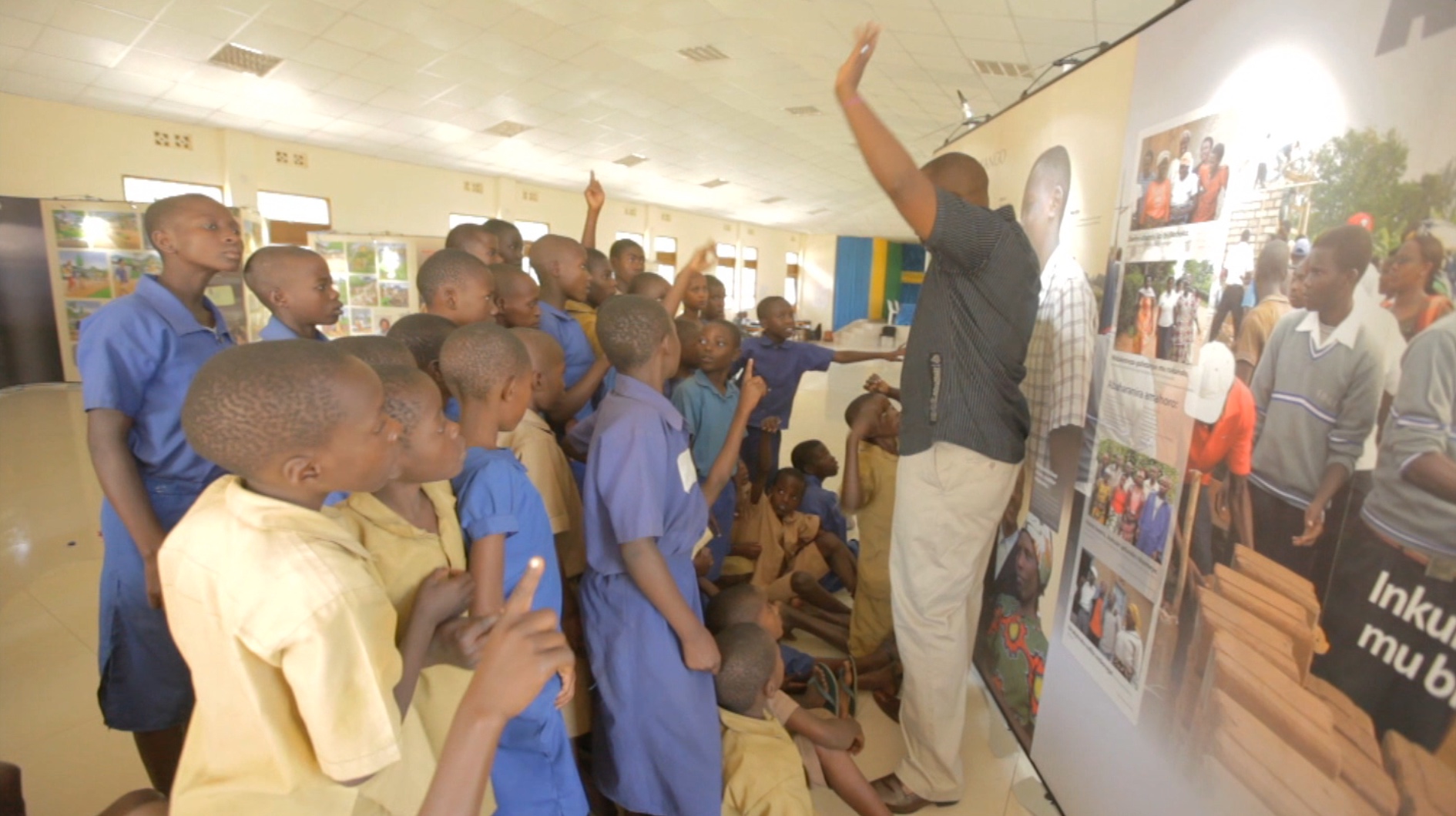 Aegis' education team lead a peace-building education workshop with students in Rwanda.