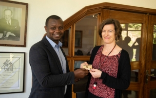 HE Helena Rietz receives Ubumuntu pin badge from Aegis Africa Representative Freddy Mutanguha at the Kigali Genocide Memorial, November 2018