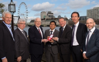 left-right Peter Freeman, Steve Noah, Ambassador Kenneth Quinn, Sokphal Din Cambodian genocide survivor, Lord David Alton, Sir Trevor Pears and Dr James Smith at the House of Lords as Ambassador Quinn receives the Steven Krulis Champion of Humanity Distinguished Service Award from the Aegis Trust in recognition of his work in countering the Khmer Rouge in Cambodia.