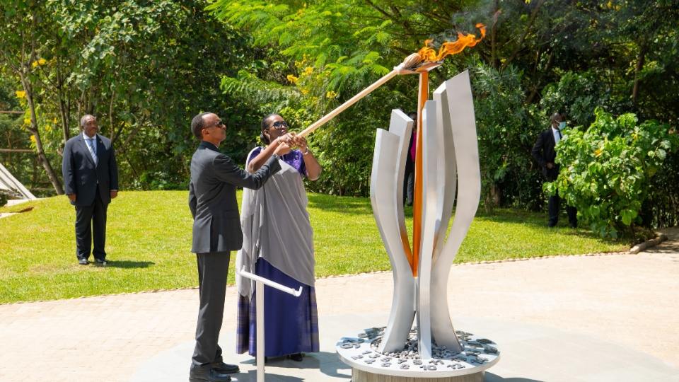 Kwibuka 26: Rwanda's President Paul Kagame lights the flame of remembrance at the Kigali Genocide Memorial, accompanied by First Lady Jeannette Kagame. 7th April 2020.