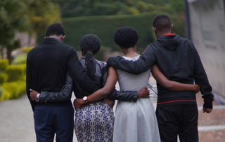 Children of genocide survivors remember at the Kigali Genocide Memorial.