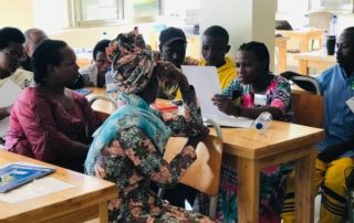 Parents in Huye, southern Rwanda, take part in a peacebuilding workshop organised by the Aegis Trust, May 2023