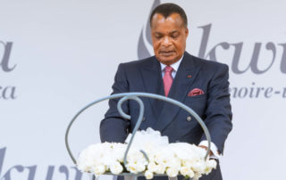 President Denis Sassou Nguesso of the Republic of the Congo lays a wreath at the Kigali Genocide Memorial